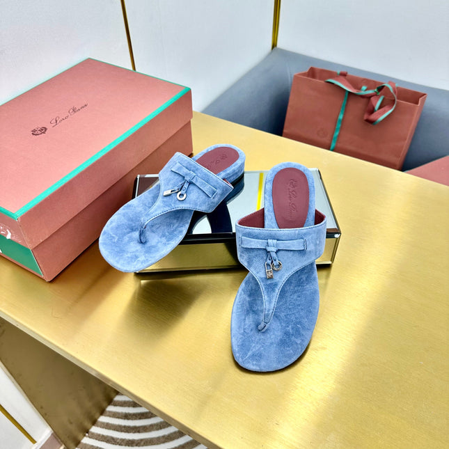 FLIP FLOPS IN BLUE SUEDE AND HARDWARE SILVER