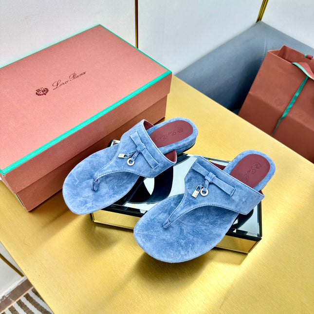 FLIP FLOPS IN BLUE SUEDE AND HARDWARE SILVER