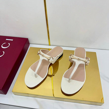 GG THONG SANDALS 25S IN WHITE LAMBSKIN WITH GOLD HARDWARE