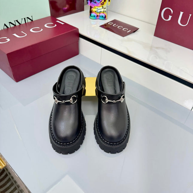 GG PLATFORM MULES 25S IN BLACK CALFSKIN