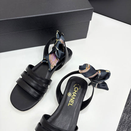 CC SANDAL 25S IN BLACK LAMBSKIN WITH SILK BOW