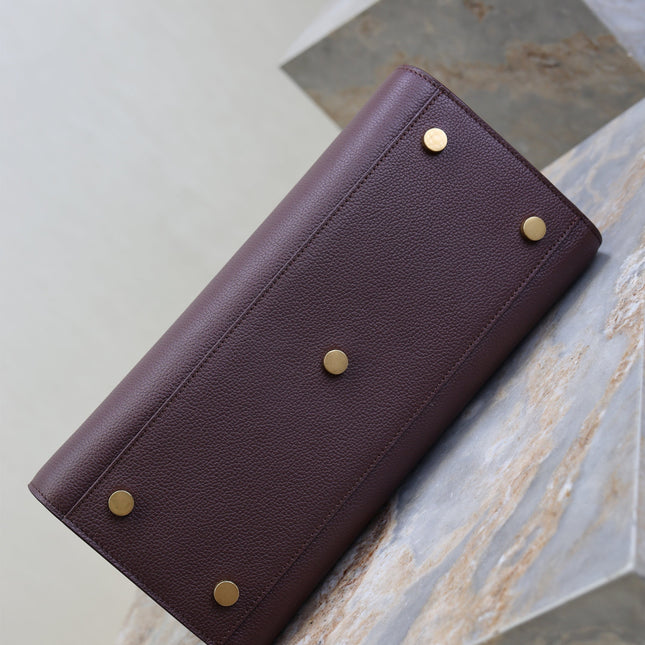 YSL 25S SAC DE JOUR GM 32 IN ROUGE CABERNET SUPPLE GRAINED CALFSKIN