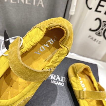 PRADA 25S COLLAPSE RE NYLON AND SUEDE BALLERINAS IN LEMON YELLOW