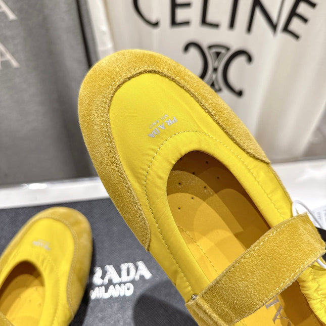 PRADA 25S COLLAPSE RE NYLON AND SUEDE BALLERINAS IN LEMON YELLOW