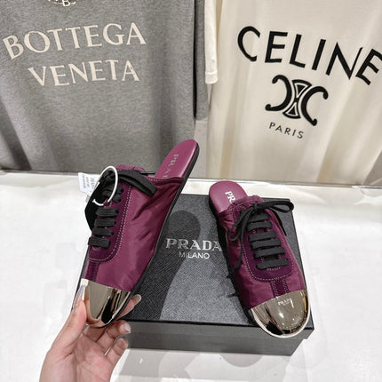 PRADA 25S MULES IN PLUM WITH METAL TOECAP