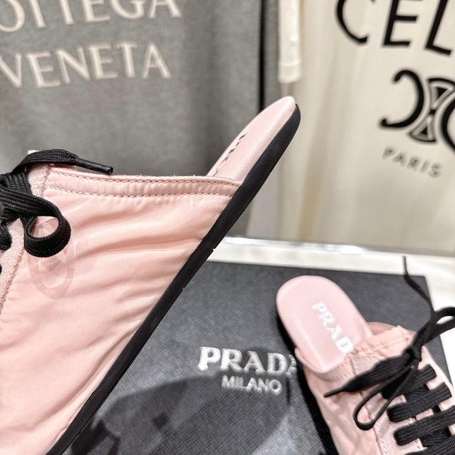 PRADA 25S MULES IN LIGHT PINK WITH METAL TOECAP