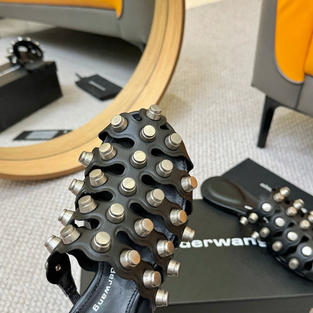 RHODES STUDDED REXA CAGE SLIDE IN BLACK LAMBSKIN