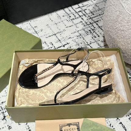 THONG SANDAL IN BLACK CALFSKIN WITH GOLD HARDWARE