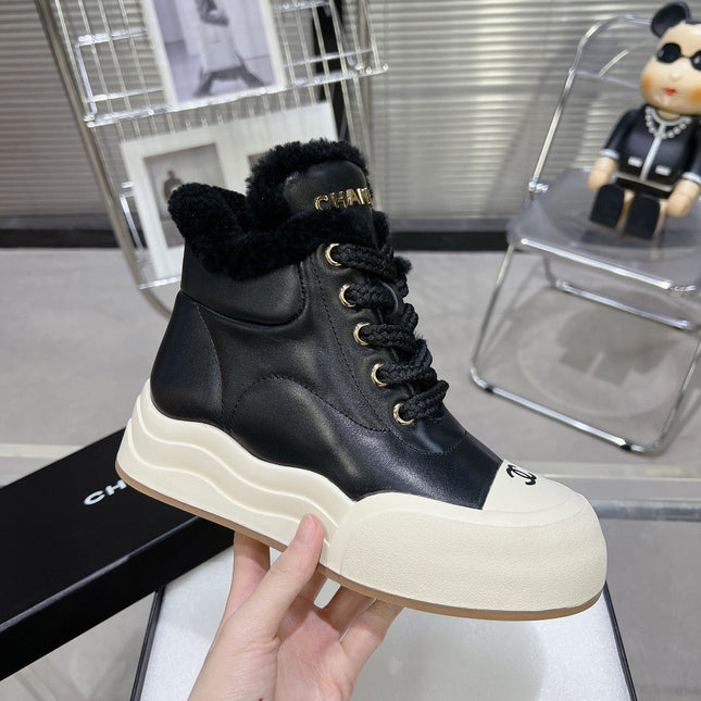 MARTIN BOOTS IN BLACK CALFSKIN AND LAMB FUR LINING