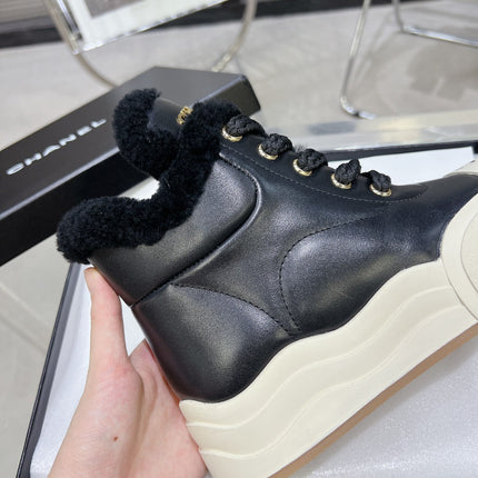 MARTIN BOOTS IN BLACK CALFSKIN AND LAMB FUR LINING