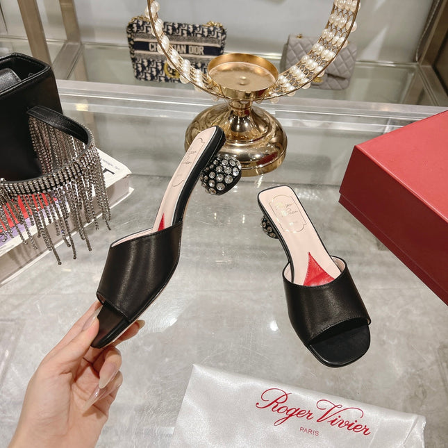 CRYSTAL HEEL MULE IN BLACK CALFSKIN