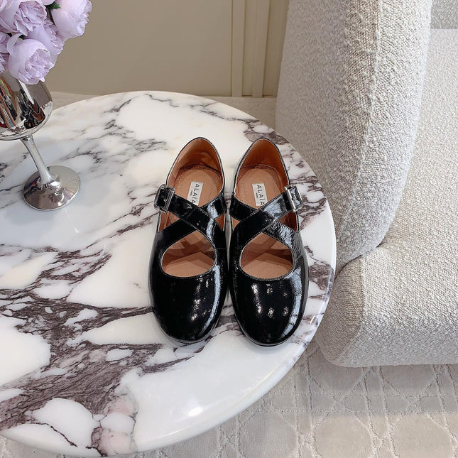ALAIA CRISS CROSS BALLET FLAT IN BLACK LAMBSKIN WITH SILVER HARDWARE
