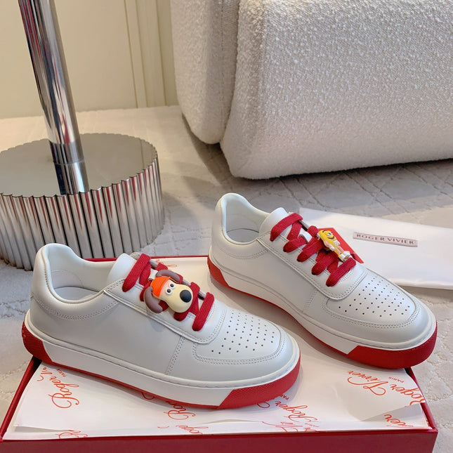 VIV' SKATE WHITE LEATHER SNEAKERS WITH RED LACES AND CARTOON CHARMS
