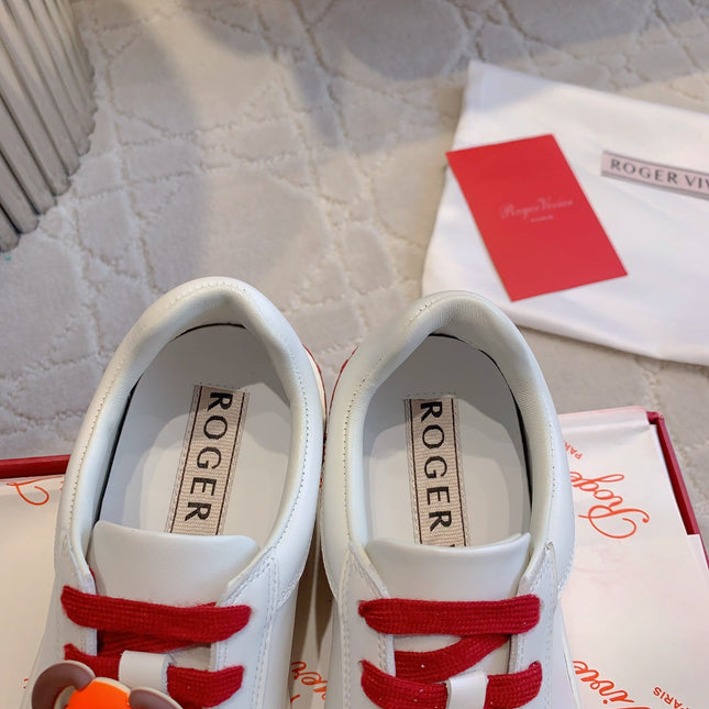 VIV' SKATE WHITE LEATHER SNEAKERS WITH RED LACES AND CARTOON CHARMS