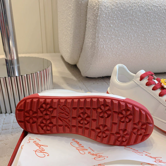 VIV' SKATE WHITE LEATHER SNEAKERS WITH RED LACES AND CARTOON CHARMS