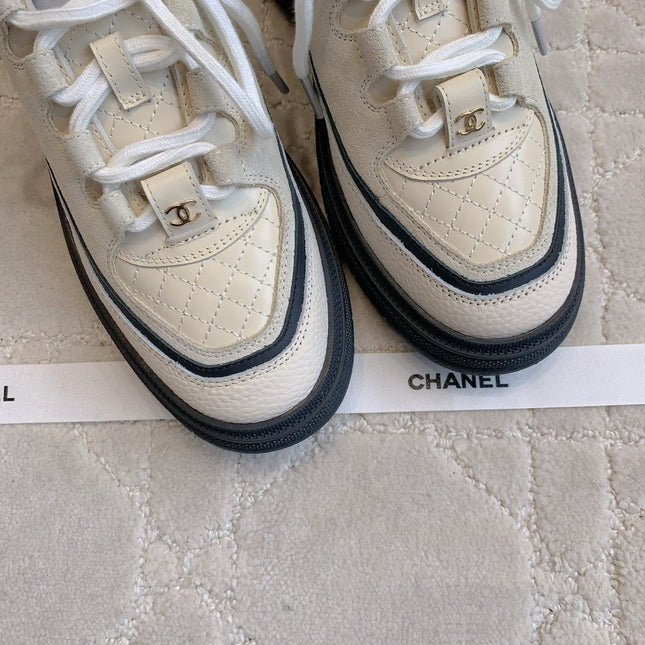CHANEL 25S TRAINERS 40MM IN WHITE AND BLACK CALFSKIN