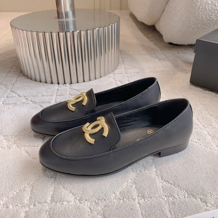 CHANEL 25S LOAFERS WITH LARGE LOGO IN BLACK CALFSKIN GOLD HARDWARE