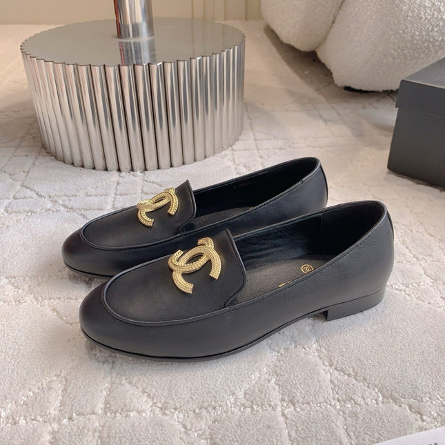 CHANEL 25S LOAFERS WITH LARGE LOGO IN BLACK CALFSKIN GOLD HARDWARE