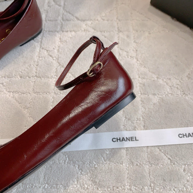 CHANEL 25S CAMELLIA SQUARE TOE FLATS IN ROSSO ANCORA CALFSKIN GOLD HARDWARE