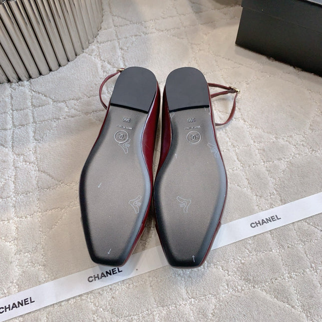 CHANEL 25S CAMELLIA SQUARE TOE FLATS IN ROSSO ANCORA CALFSKIN GOLD HARDWARE