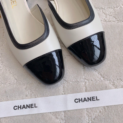 CHANEL 25S SLINGBACK IN BLACK AND WHITE CALFSKIN GOLD HARDWARE