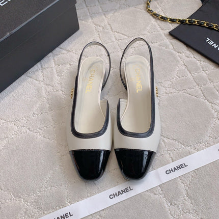 CHANEL 25S SLINGBACK IN BLACK AND WHITE CALFSKIN GOLD HARDWARE