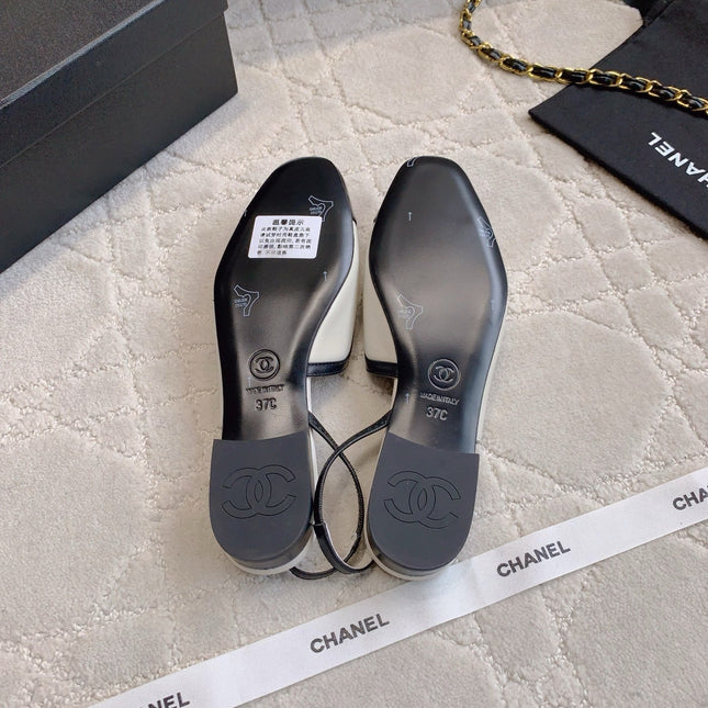 CHANEL 25S SLINGBACK IN BLACK AND WHITE CALFSKIN GOLD HARDWARE