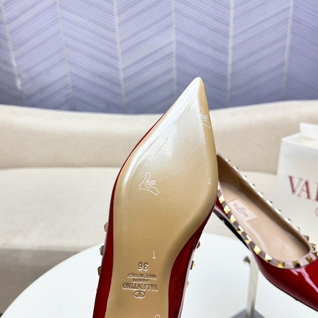 ROCKSTUD FLAT PUMP IN BERRY RED CALFSKIN