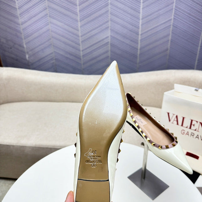 ROCKSTUD FLAT PUMP IN WHITE CALFSKIN