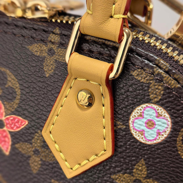 LV 25S NANO ALMA 18 IN BROWN MONOGRAM CANVAS PRINTED WITH THE VIVIENNE MASCOT