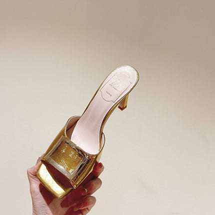 TRUMPET METALLIC MULES IN GOLD PATENT CALFSKIN
