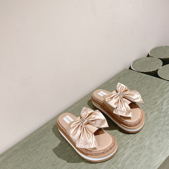 CC SLIPPERS WITH SILK BOW IN BEIGE ALMOND COWHIDE