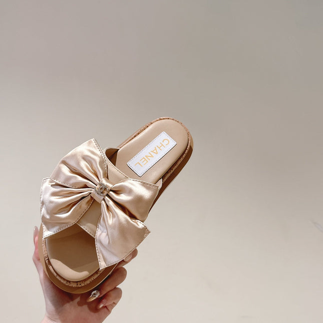 CC SLIPPERS WITH SILK BOW IN BEIGE ALMOND COWHIDE
