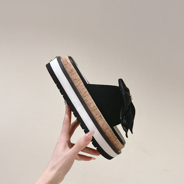 CC SLIPPERS WITH SILK BOW IN BLACK COWHIDE