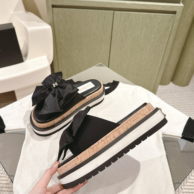 CC SLIPPERS WITH SILK BOW IN BLACK COWHIDE