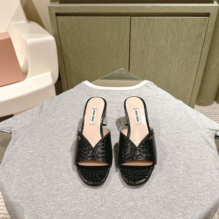 JEWELLED HEEL 55 MULE SANDALS IN BLACK CALFSKIN