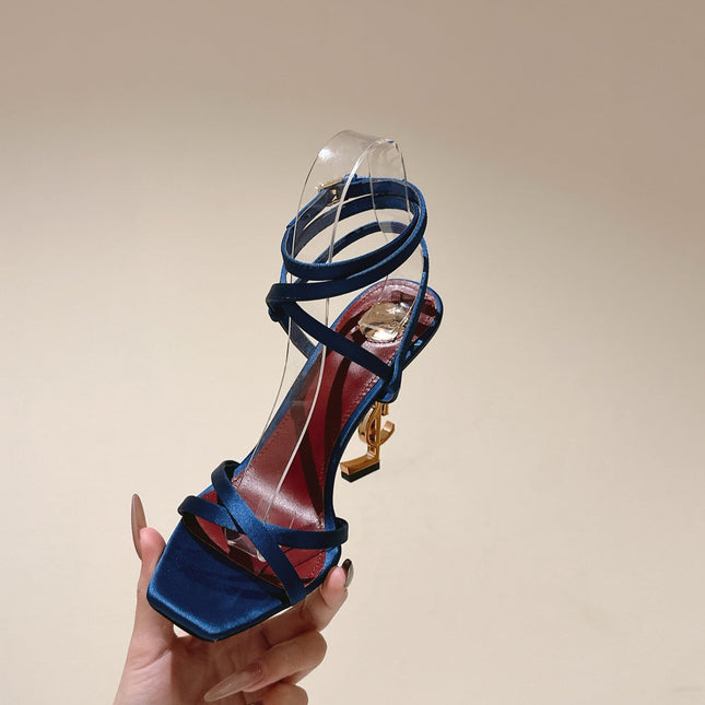 YSL 25S HIGH-HEEL SANDALS 100 MM IN DEEP NAVY BLUE SATIN WITH YSL LOGO HEEL DESIGN IN GOLD