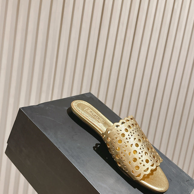 ALAIA PERFORATED SLIDE SANDALS 25S IN LIGHT GOLD LAMBSKIN