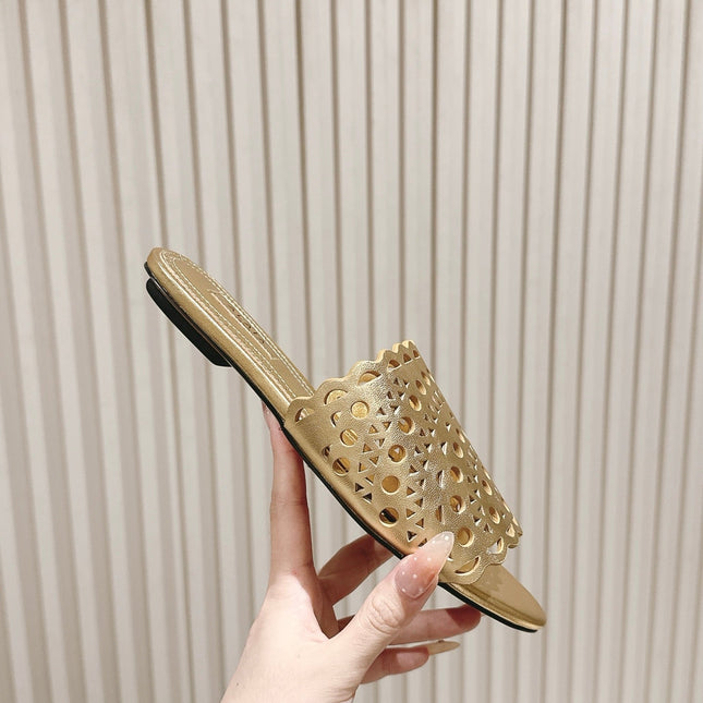 ALAIA PERFORATED SLIDE SANDALS 25S IN LIGHT GOLD LAMBSKIN