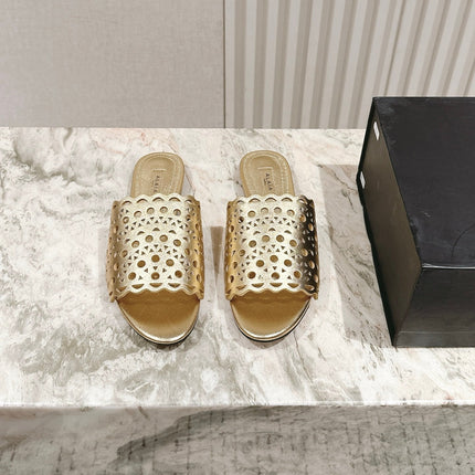 ALAIA PERFORATED SLIDE SANDALS 25S IN LIGHT GOLD LAMBSKIN