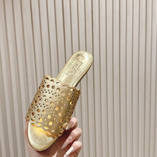 ALAIA PERFORATED SLIDE SANDALS 25S IN LIGHT GOLD LAMBSKIN