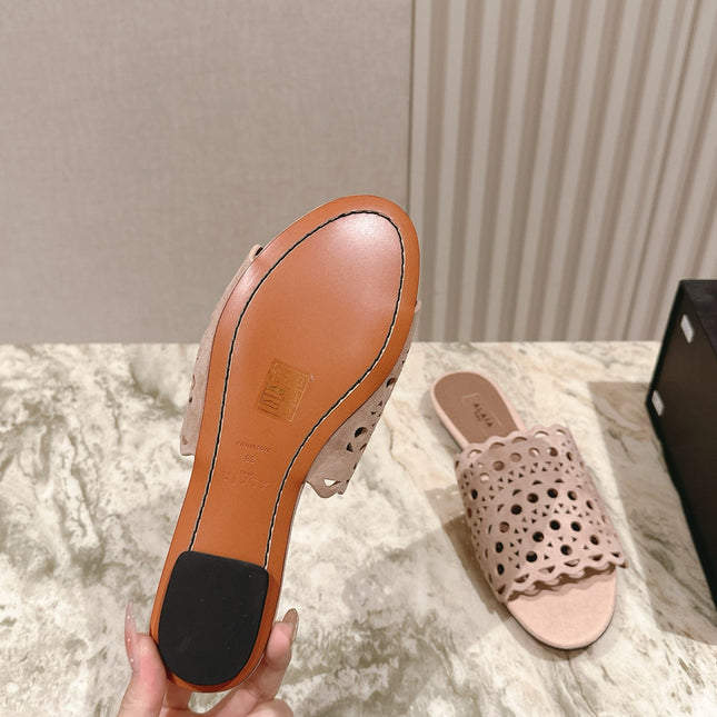 ALAIA PERFORATED SLIDE SANDALS 25S IN PINK BEIGE SUEDE