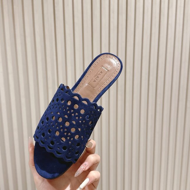 ALAIA PERFORATED SLIDE SANDALS 25S IN NAVY BLUE SUEDE