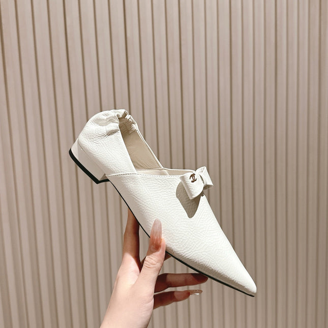 CC FLATS 25S IN WHITE PATENT LEATHER