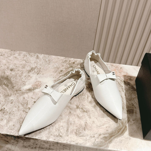 CC FLATS 25S IN WHITE PATENT LEATHER