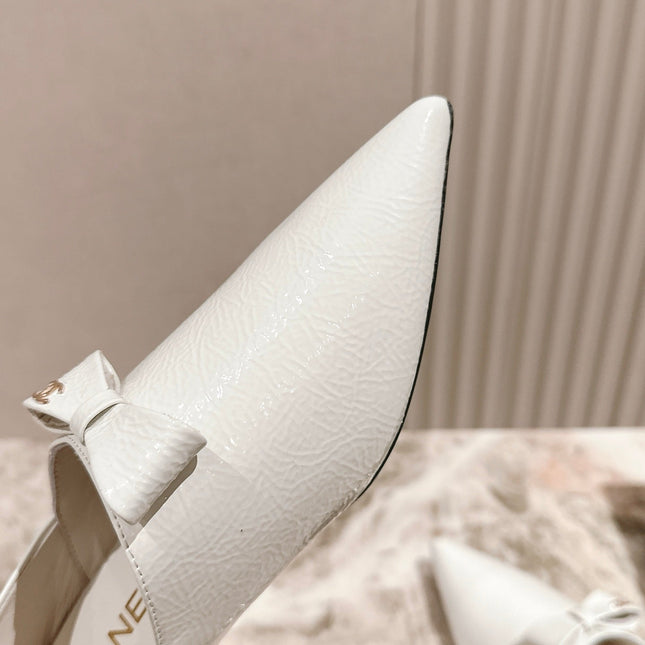 CC FLATS 25S IN WHITE PATENT LEATHER