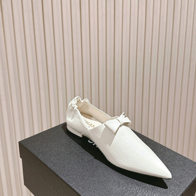 CC FLATS 25S IN WHITE PATENT LEATHER