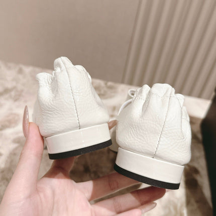 CC FLATS 25S IN WHITE PATENT LEATHER