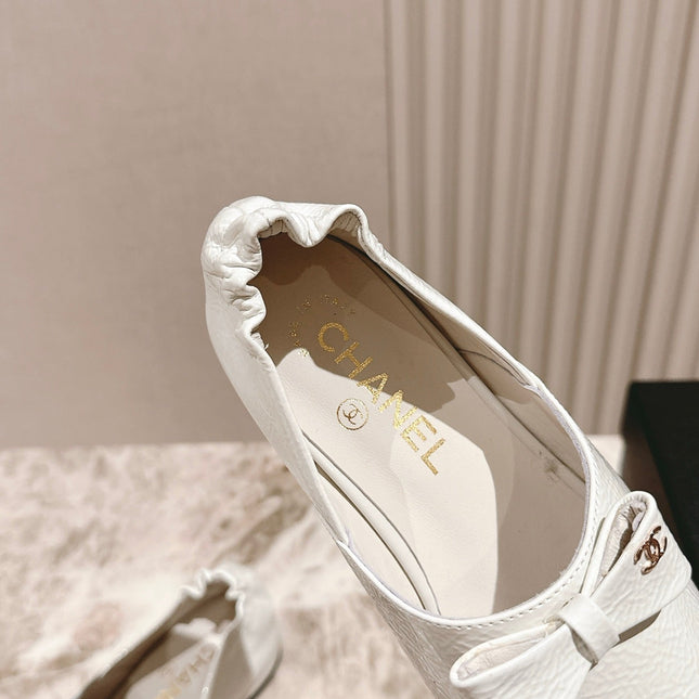 CC FLATS 25S IN WHITE PATENT LEATHER