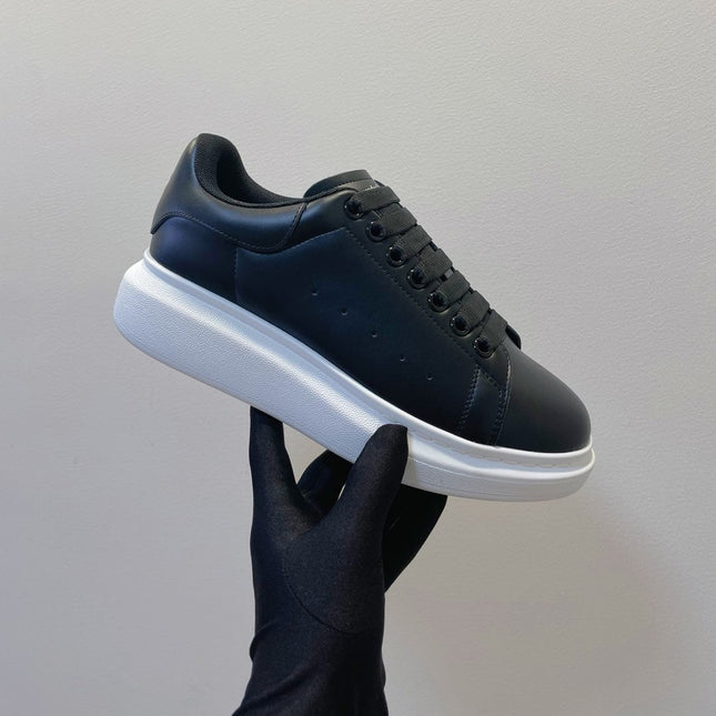 OVERSIZED SNEAKERS IN BLACK SMOOTH CALFSKIN WITH BLACK HEEL DETAIL